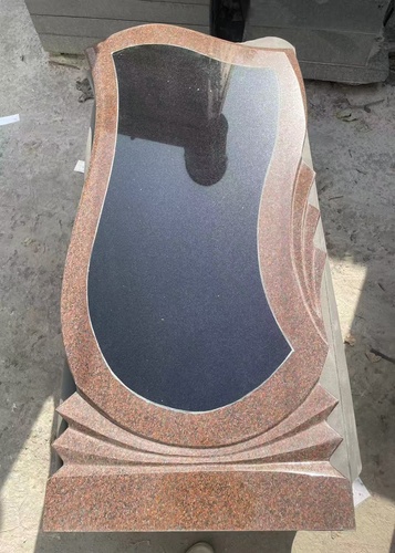 Black Granite Headstone Trimmed With Red Granite