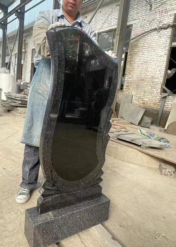 Black Granite Headstone Trimmed With Brown Granite
